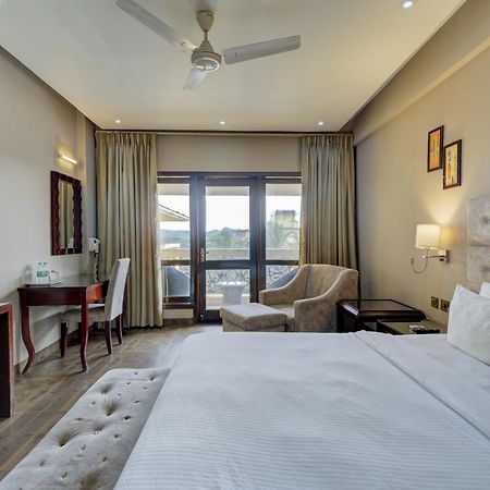 De Alturas Resort Candolim Bagian luar foto